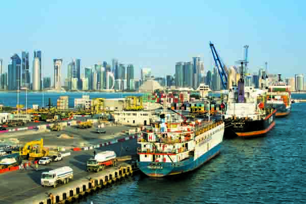 Container ships at pier and skyline