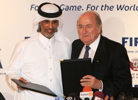 FIFA president Sepp Blatter (R) and Qata